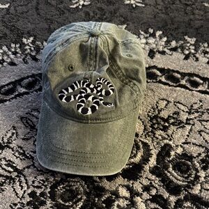 Green Cap with Snake Embroidery